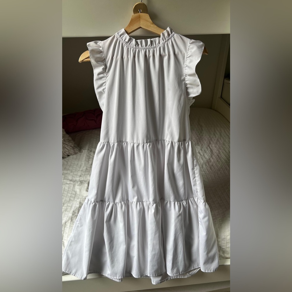 White ruffle sleeveless tiered mini dress